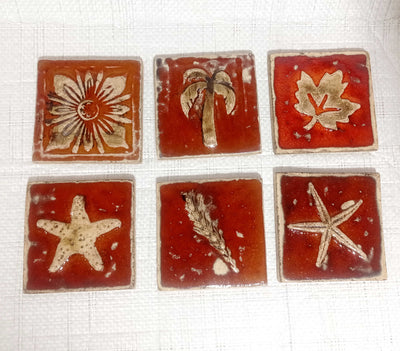 אריחים,10/10,  אריחי קרמיקה, כתום כהה, בתבליטים שונים לבחירה