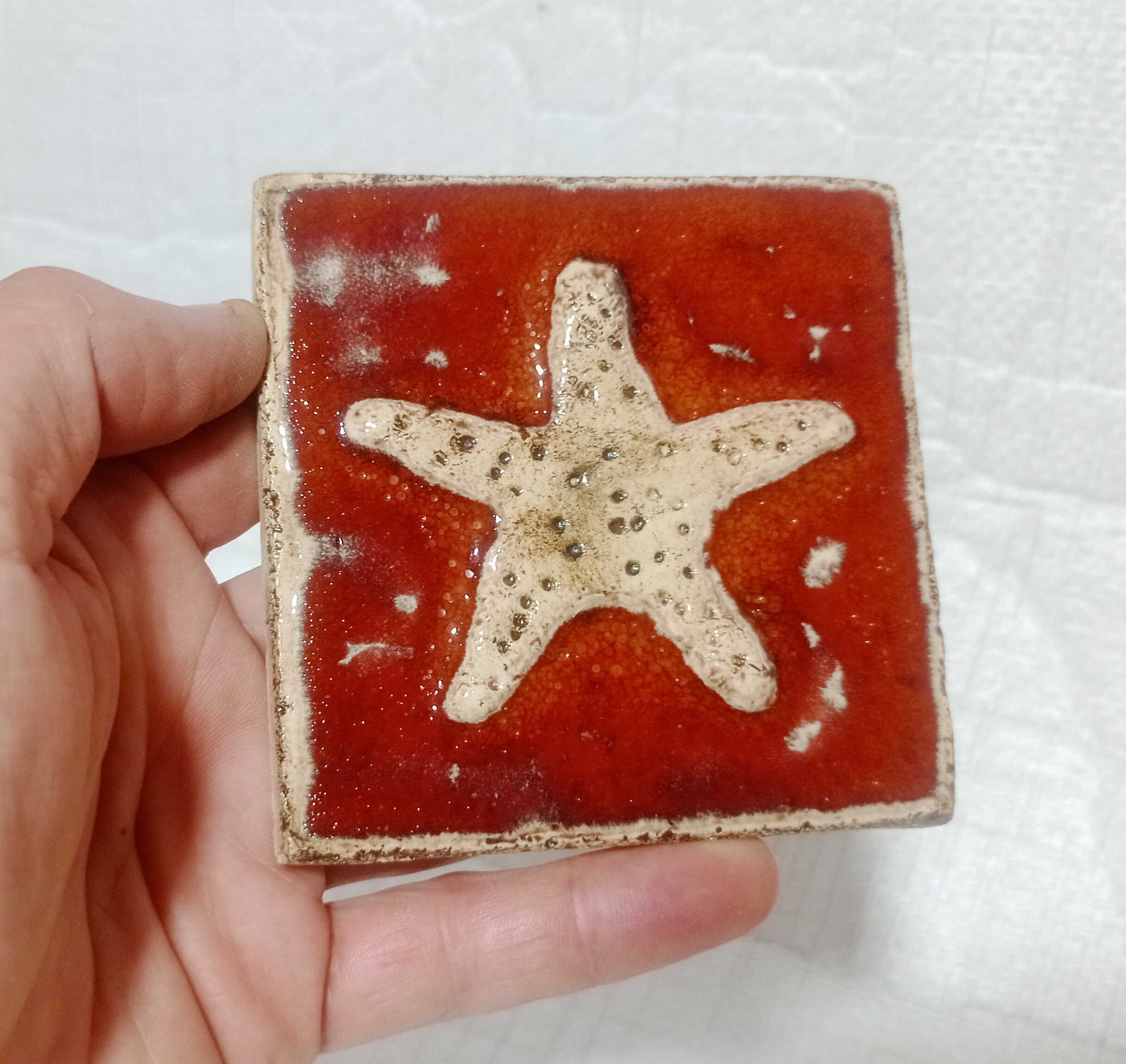אריחים,10/10,  אריחי קרמיקה, כתום כהה, בתבליטים שונים לבחירה