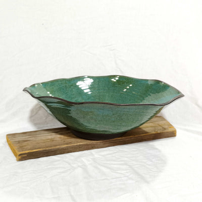 קערת קרמיקה אובלית מסולסלת בכחול