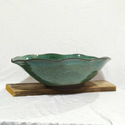 קערת קרמיקה אובלית מסולסלת בכחול