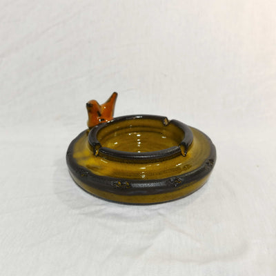 מאפרה עגולה צהובה  עם ציפור